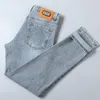 Designer de jeans pour hommes Hong Kong Fashion Brand Été Mince Bleu Polyvalent Casual Élastique Slim Fit Petit Pantalon Droit ZB9S
