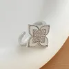 Bague en zircon incrusté de fleurs à quatre feuilles douces pour filles, bague en acier au titane de haute qualité pour femmes, fête de mariage