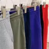 Novas calças masculinas de tecnologia azul escuro, calças esportivas de grife, roupas da moda, listras laterais, cordão, calças esportivas303W