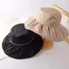 Nouvelle perle plissée grand bord casquette de pêcheur femmes été français Portable seau Chapeau Protection UV crème solaire plage Chapeau Femme
