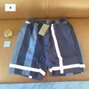 Baddräktshorts för män och kvinnor Designers som inte väljer sina kroppar är på modet på sommaren Snabbtorkande baddräkt med tryckta strandbyxor M-3XL