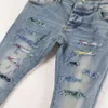 FALECTION UOMO 21SS AMIMIKE JEANS EFFETTO ART WORK PATCH DENIM STRAPPATO jeans252y