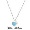 Designer Neckcross Border Product Halsband, Love Emalj hjärtformade hängen, Titanium Steel Valentine's Day -gåvor, flickvän smycken grossist