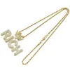 Hip Hop Rapper colgante de diamante brillante collar de oro corona letras RICAS colgante micro-inserción joyería de circón 60 cm accesorio de club nocturno Cadena de suéter 1395