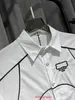 Erkekler Tasarımcı Gömlek El Boyalı Renk Sprey Logo Letting Yaz Modasında Gevşek Polos Plaj Tarzı Nefes Alabilir Genişletilmiş Kısa Kollu Gömlek Giyim Boyutları M-3XL
