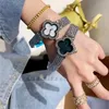 Damesmode polshorloge Horloges Hoge kwaliteit Bloemen Kristal Stijl Stalen Metaal Quartz Horloge Montre De Luxe Geschenken