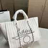 Diseñador de lujo Moda Mujer Bolsos de playa Totes Gran capacidad Espacioso Cuerpo Tiempo libre Pasar las vacaciones Bolso de hombro de mujer de alta calidad