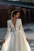 ファッション A ラインのウェディングドレス花嫁のためのプランジング V ネックグリッターウェディングドレスジッパーバック長袖デザイナーブライダルドレス