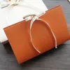 Present Wrap 22 7 5 13 5cm 10st Orange Beige Paper Box med handtag Candy Cookie Chocolate Macaroon Wedding Packaging 230701