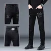 Jeans pour hommes Designer haut de gamme Forage chaud Jeans de mode Hommes 2022 Automne et hiver Nouveau Noir Stretch Tendance Polyvalent Petit Pantalon BG5A