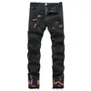 Jeans viola maschili jeans jeans women pantaloni neri distrutti la moda sottile motociclista dritte dritte jeans casual hip-hop cerniera hip-hop uomini strappati buca