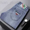 Mäns jeansdesigner och vårens höst AJ Brand Elastic Casual Slim Small Foot Light Kadt