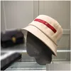 Chapeaux à large bord Classique Seau Chapeau Designer Femmes Hommes Marque De Luxe À Bords De Pêche En Plein Air Lettre P Sun Cap Summer Fit Drop Delivery Dhbhw