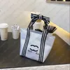 Mode féminine marque de luxe Designer sac décontracté petit sac sac à provisions Bow fourre-tout sac sous les bras sac à main rayé sac en toile qwertyui879