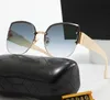 Principais designers de luxo Man Mulher Sunglasses Classics de moda ao ar livre Os óculos de sol Viagem de verão Goggles à prova d'água Proteção de radiação de estilo de alta qualidade Proteção de radiação