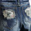 Męskie spodenki letnie męskie Vintage porwane krótkie dżinsy Streetwear dziura wąskie spodenki jeansowe męskie markowe ciuchy Z230703