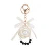 Pretty Fabric Flower Pearl Ribbon Bow Keychains Car Key Ring New Fashion Bag Purse Charms Nyckelkedja för kvinnliga flickor gåvor