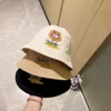 Bucket Hats Designer Bucket Hat Svartvitt blommönster Enfärgad Fisher Man's Hat Dam Kepsar Brev Patchwork Män Kvalitet ClashGki#