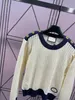 Kvinnors tröjor Designer 2023 Runway Hollow Out Sticking Ladies Fashion Kort ärm Casual O-Neck Women Button Pullover Jumper E12P