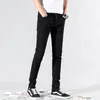 Jeans da uomo Jeans skinny elasticizzati da uomo Moda Pantaloni casual slim fit in denim Pantaloni blu cielo bianco nero Abbigliamento maschile di marca 230701