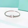 Designer Tiffancy Armband Fashion Clover Tiffanyset Armband 18K Guldarmband Dubbel T -formade armband Kvinnor Syckel älskar kvinnor Guld Bangle Tiffanybracelet 570