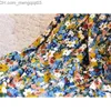 Spódnice damskie kwiat plisowana spódnica bawełniane kolorowe kwiatowe guziki z nadrukiem eleganckie długie spódnice z rozcięciem Z230706