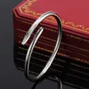 Mode nagelarmband nagel armband designer smycken charm armband kedja 18k guld pläterat silver rostfritt stål för kvinnor flicka bröllop mors dag smycken män