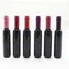 Lege zwarte plastic lipglossfles met gekleurde dop, wijnvorm creatieve draagbare lipglossbuis, lippenstiftbuis F3645 Mjwwo