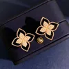 New designed Ear studs Luxurious carved design diamond studded four petal flower women's earrings Designer Jewelry P05