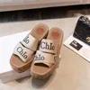 2024 summer new cross-letter printing thick-soled slippers inner height-increasing woven bag hemp rope beach sandals and slippers women 35-42