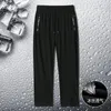 Pantaloni da uomo Summer Ice Silk Zipper High Elastic Casual