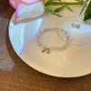 Charm Bracelets Limax Opal Bell 팔찌 여성 틈새 시장 디자인 고급 감각 핸드 액세서리 간단한 가벼운 고급 스타일 다목적