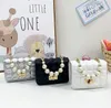 Mode meisjes prinses handtas mini schattige baby bericht schoudertas kleine kinderen parel portemonnee