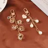 Pearl Pink Peach Heart Alloy Key Chain Pendant for Women Gift Creative Diamond Perfume Metal Accessories Bag Decoration