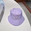 2023 Nuovo cappello a secchiello per uomo Moda Donna Parasole Berretto a secchiello P Triangolo invertito Protezione solare Coppie Stessi cappelli da sole neutri