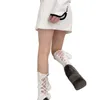 Skarpety damskie dziewczęce prążkowane bawełniane łydki Harajuku Gothic słodka pluszowa piłka w kratkę sznurowane Bowknot Hollow Out Mid Tube