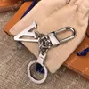 مصمم المفاتيح العلامة التجارية الفاخرة Keyring حرف كلاسيكي سلسلة مفاتيح الأزياء Women Bag Charm Men Car Carchains حلقة مفتاح محمولة