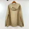 Trench da donna 2023 Cappotto con cappuccio cachi primavera Moda donna Vintage Coulisse Giacca a vento allentata Mantello antivento Capispalla femminile