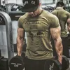 T-shirts pour hommes Lettre de mode d'été Impression T-shirt à manches courtes pour hommes Sports Compression Tight Fitness Base Layer Gym Top J230705