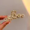 Pinces à cheveux mode coréenne perle diamant incrusté accessoires creux conception de niche poignée en métal français rétro épingle à cheveux bijoux de fête pour les femmes