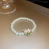 Halsband Örhängen Set Pearl Flower Leaf Sydkorea Liten och ren Frisk lantlig vindöronkrok Sammandragen kvinnlig temperament