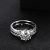 Med sidostenar KNOBSPIN D VVS1 Ringar för kvinnor Sparkling Diamond Brudset med GRA s925 Sterling Sliver Pläterad 18k band 230704