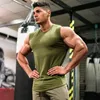 Linne för män Summer est Brand Herr Böjd nederkant Enfärgad Gym Stringers Väst Bodybuilding Kläder Fitness Man Tankar 230704