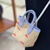 Дизайнерский дизайнерский вышивка соломенная сумка летняя пляжная сумка мода кросс -кусочка сумка для плеча ковша женские сумочки роскошные классические женские кошельки 230705
