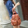 Mochila de cuero de vaca para mujer, bolsos de calle a la moda, mochilas reales de alta calidad para chicas adolescentes, bolso de hombro escolar para mujer