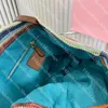 Designer Bolsa de praia Mulheres bolsas de sacolas Carta de listra de listra de palha tecido para viagens ao ar livre Bolsa de férias Moda versátil