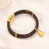 Diseñador de moda Pulseras Brazalete de cuero v Joyería Chapado en acero inoxidableAmantes de la boda Brazaletes de regalo