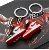 Großhandel 5 cm hochwertige dreidimensionale Sportartikel-Bild Schlüsselanhänger Tasche hängende Ornamente