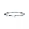 Kvinnor Designer Armband T1 Smal diamantgångjärn Armring Flickor Mode tiffa Armband ring örhängen Premium Lyx Smycken Förlovning Bröllopspresent med ask