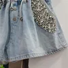 Kvinnors jeans kvinnor streetwear mode denim shorts kvinnor hög midja pärlor lapptäcke avslappnad kort feminino lös all-match sommar